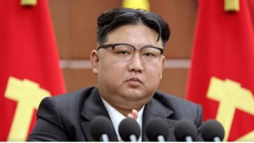 North Korean leader Kim Jong Un delivers a speech during a year-end plenary meeting of the ruling Workers' Party. PHOTO/AP