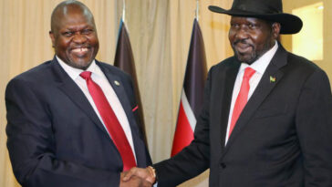 President Kiir and First Vice President Dr. Riek Machar shae hands after a meeting in Juba, South Sudan. Photo Courtesy