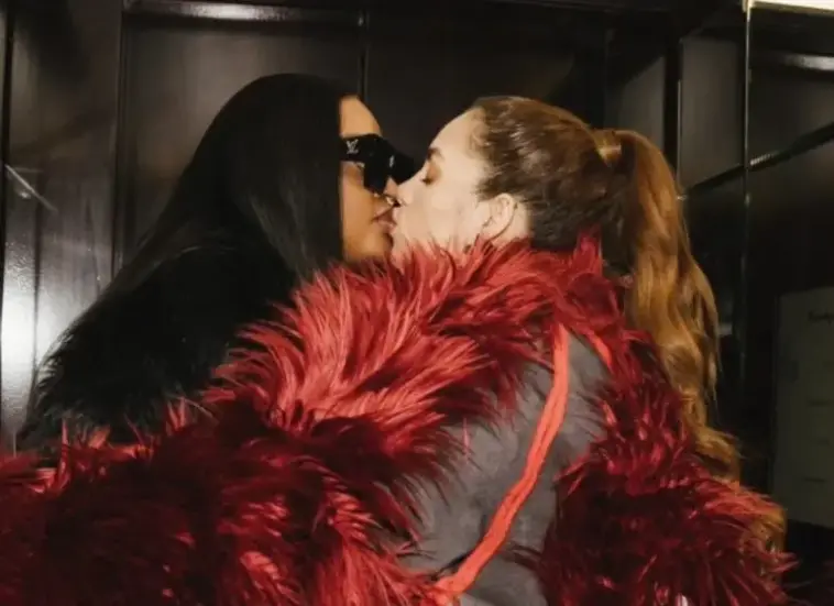 Brenda Biya kissing Brazilian model Layyons Valença. PHOTO COURTESY